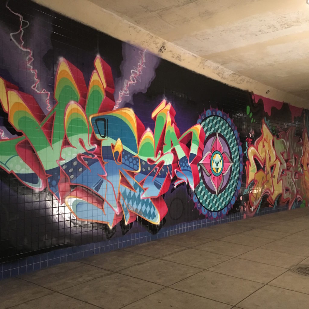 Dupont Underground - spraymainted murals on tunnel walls