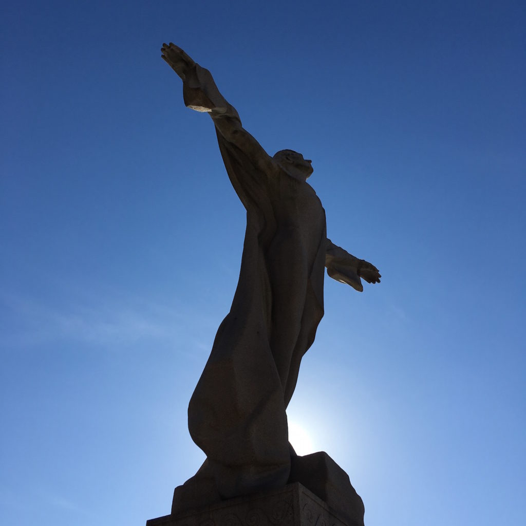 Titanic Memorial - silhouette of memorial with sun in the background