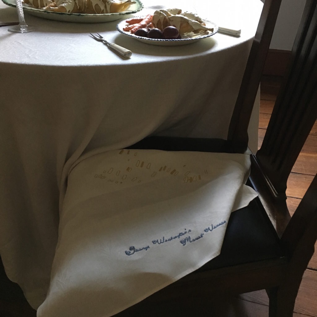 Centennial of the Everyday - Unmarked graves at Mt. Vernon embroidered on a napkin