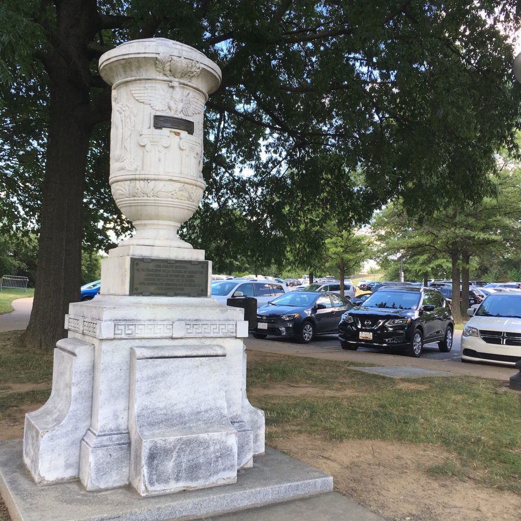 Cuban-American Friendship Urn next to parking lot