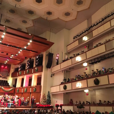 Merry TubaChristmas - Tuba players on surrounding balconies