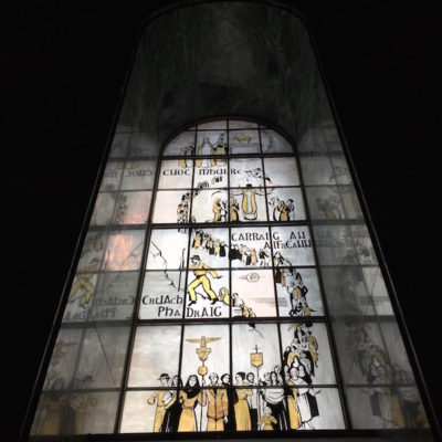 Basilica of the National Shrine of the Immaculate Conception - Alabaster window in the Mary Queen of Ireland chapel showing a pilgrimage