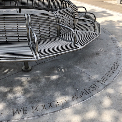 HIV AIDS Caregivers Memorial - Circle bench outside metro